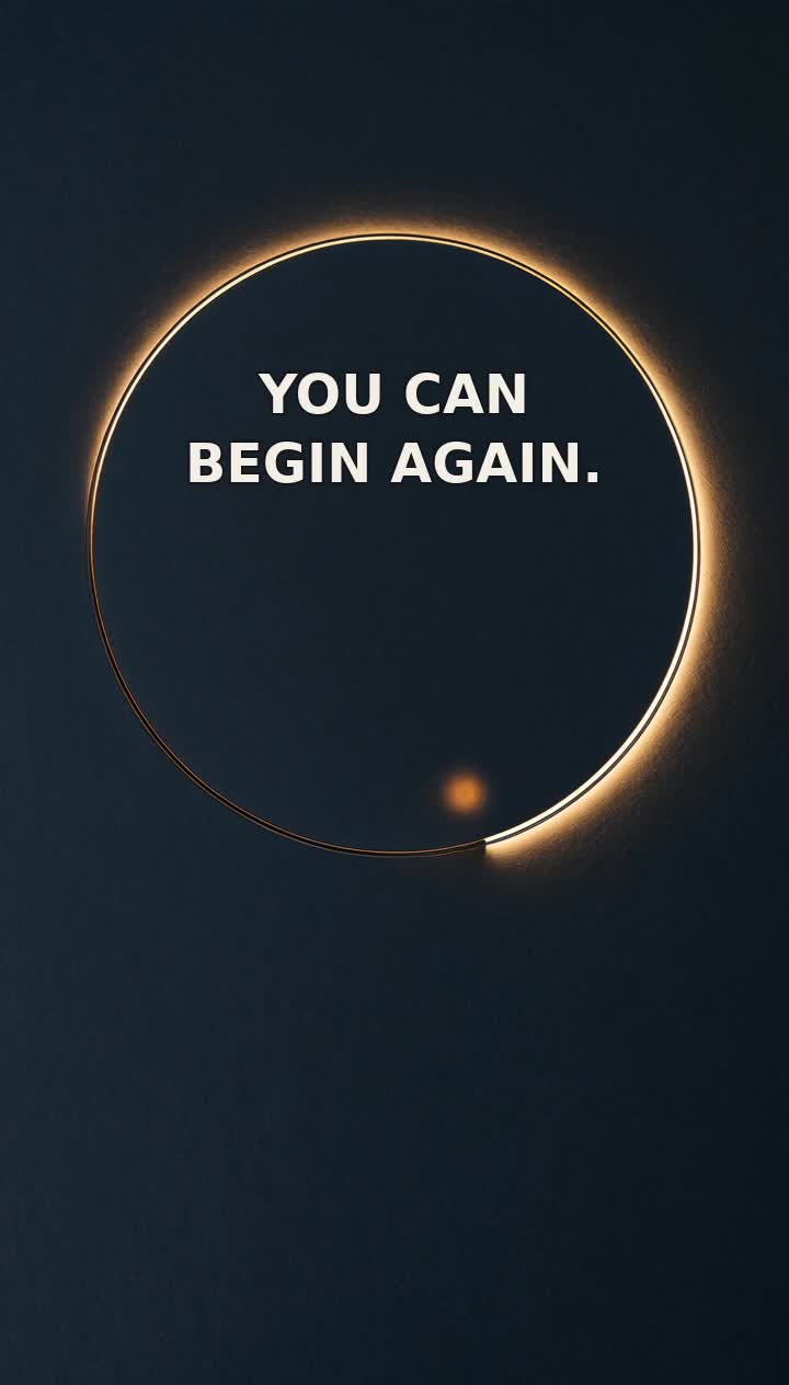 An amber-lit ring against a dark field